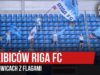 9 kibiców Riga FC w Gliwicach z flagami (25.07.2019 r.)